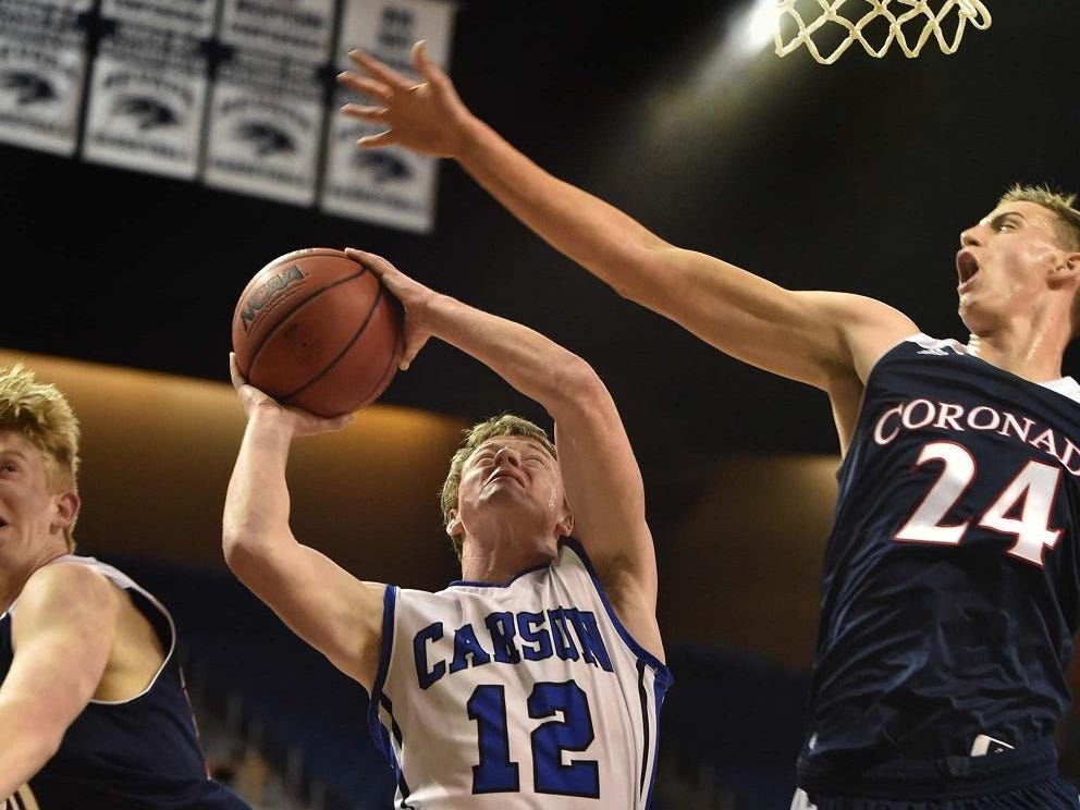 Carson’s Asa Carter shoots against Coronado during the Division I state tournament in Reno.