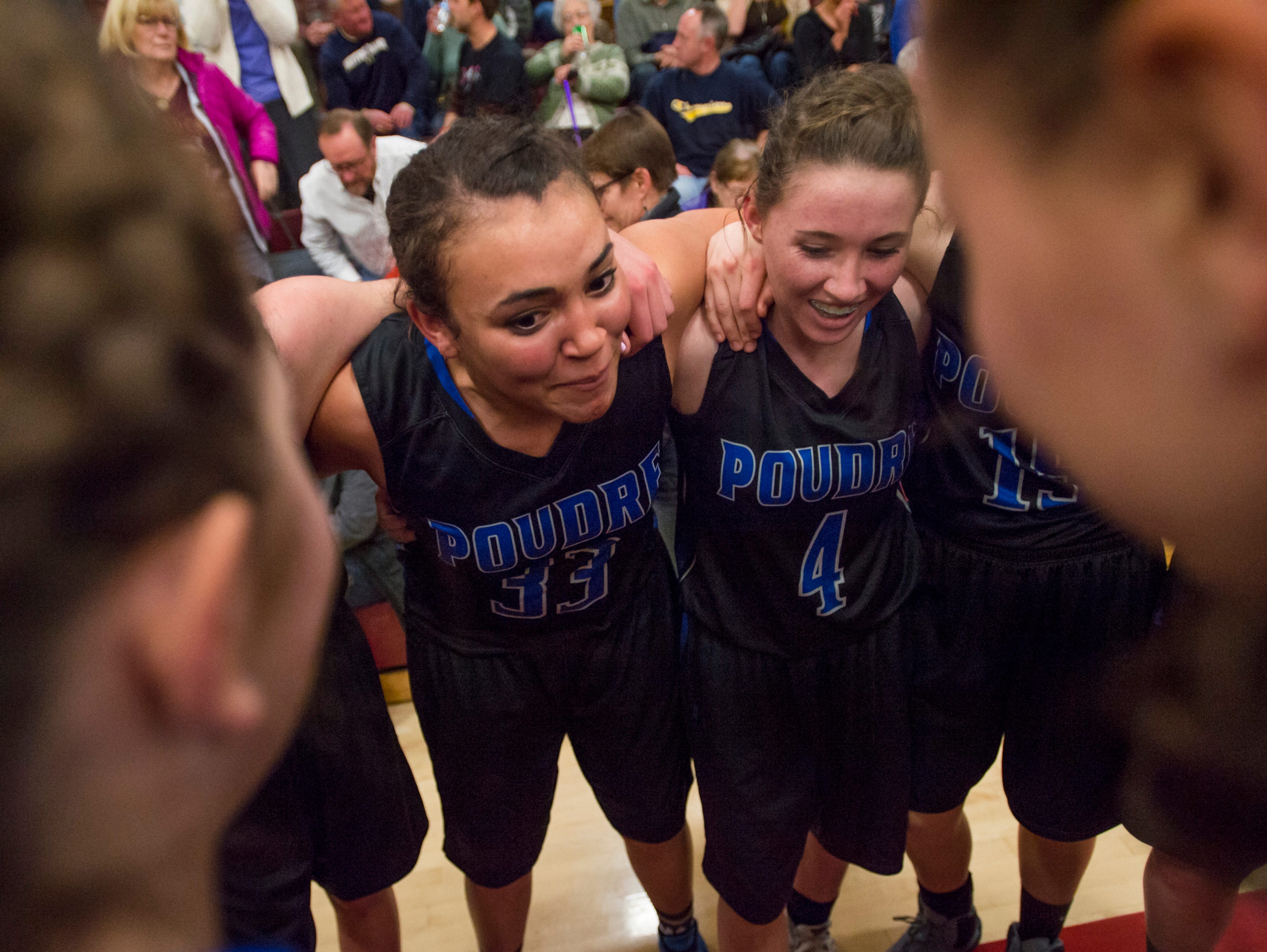 The Poudre High School girl's basketball team celebrates a 47-34 win over Rocky Mountain High School on Tuesday, January 26, 2016, in this file photo. The Impalas knocked off crosstown foe Fossil Ridge on Monday.