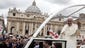 epa04182193 Pope Francis waves from his Popemobile