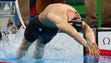 Aug. 8: American Ryan Murphy hits the pool to start