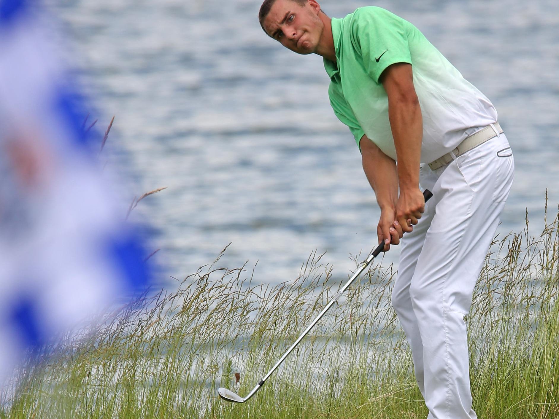 FILE -- Westfield's Timmy Hildebrand chips during the state high school golf tournament in June. He won the Indiana Open, and will attend Purdue next month.