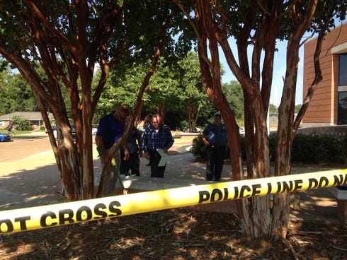 Law enforcement authorities are on the scene of a shooting outside the Madison County courthouse.