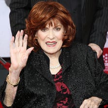 Maureen O'Hara arrives at 2014 TCM Classic Film Festival's Opening Night Gala at the TCL Chinese Theatre in Los Angeles. Harry Belafonte and O'Hara are among those will be honored by the Motion Picture Academy's board of governors.