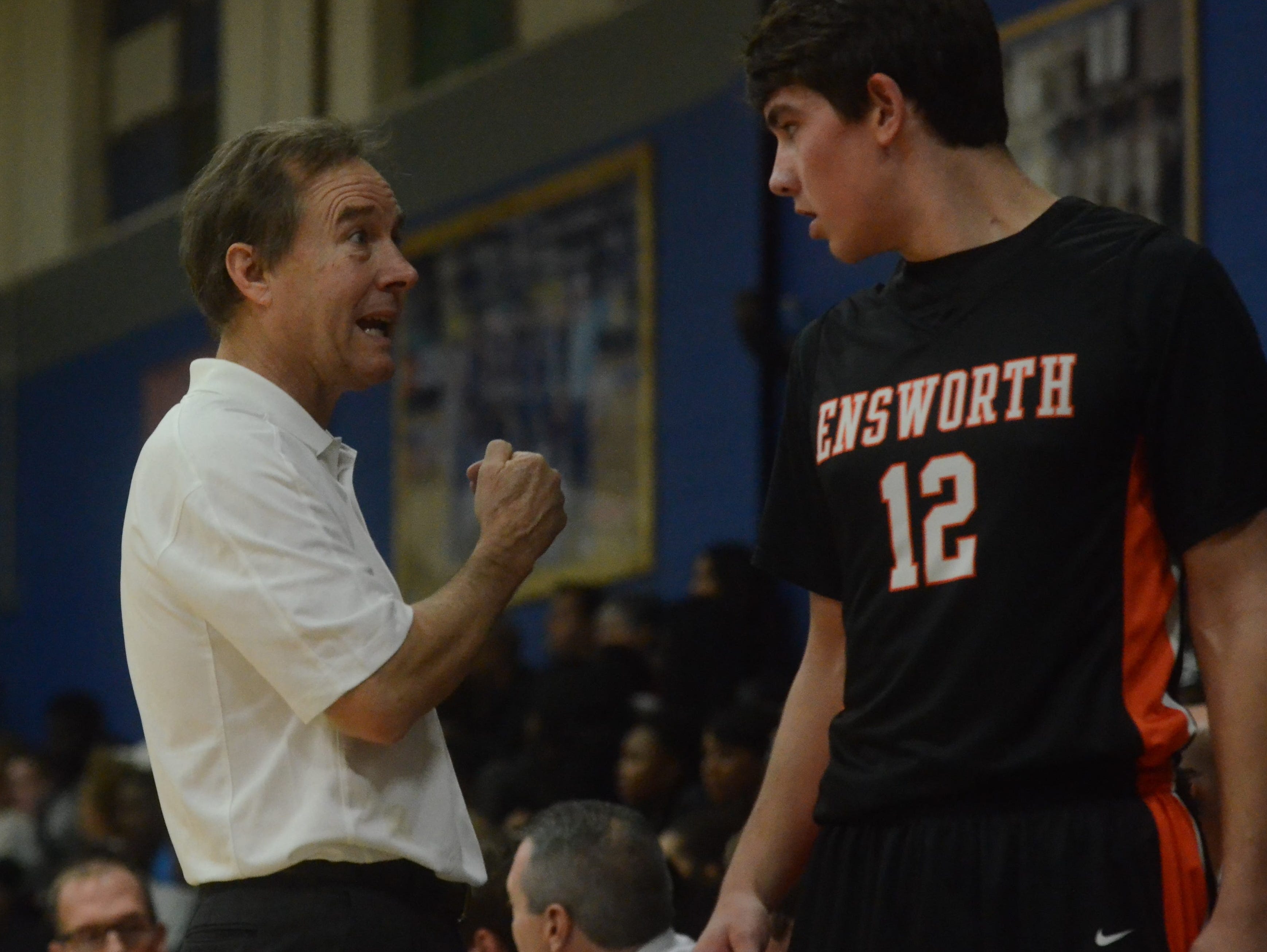 Ensworth coach Ricky Bowers talks to Jack Zager during the first half of Friday’s game at M.L. King.