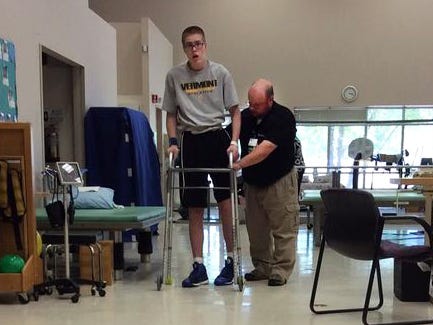 Josh Speidel works with his therapist at The Rehabilitation Hospital of Indiana in Indianapolis.