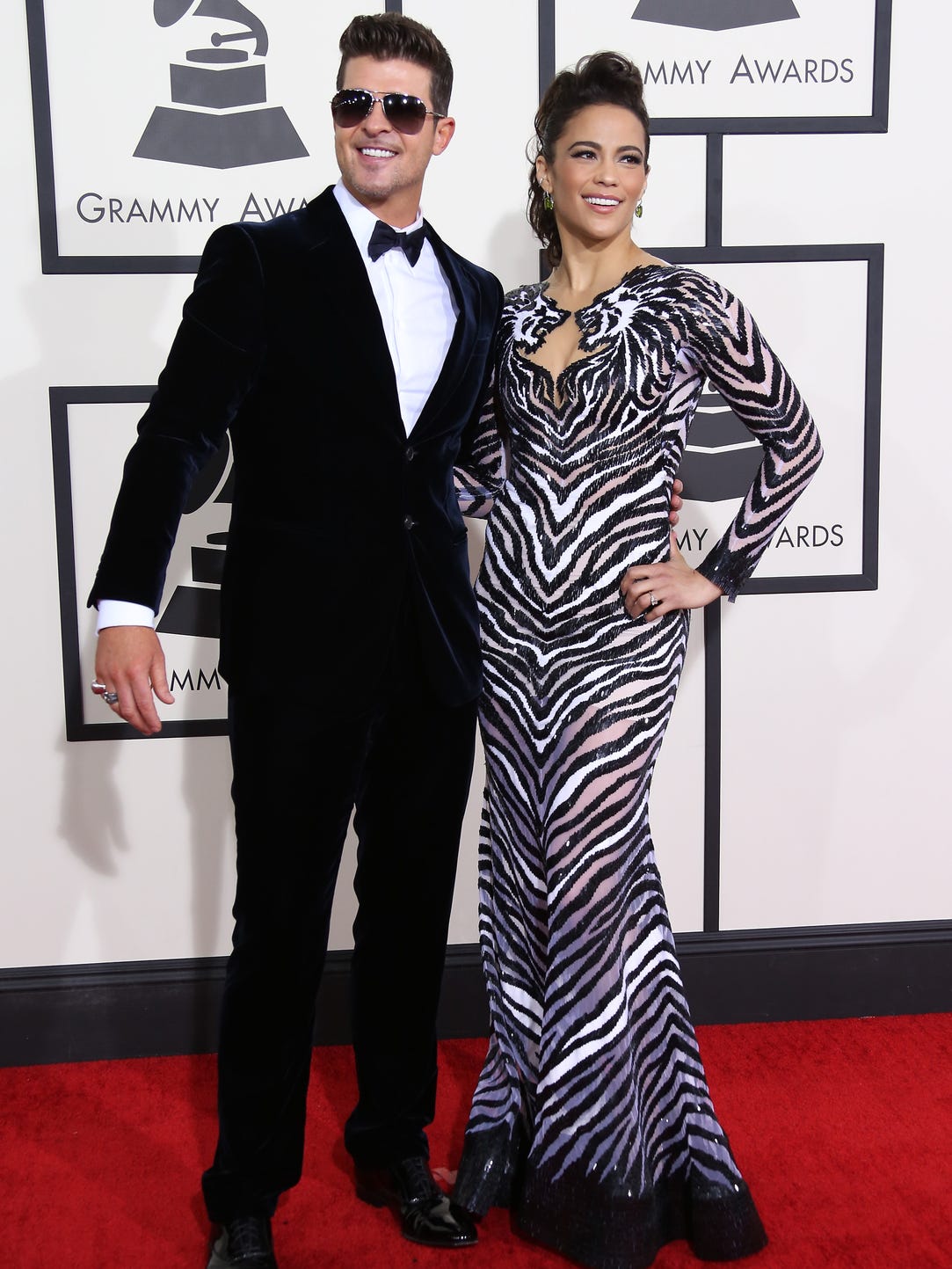 Well, their marriage made it more than eight years. Singer Robin Thicke and actress Paula Patton announced on Feb. 24 that they're calling it quits. "We will always love each other and be best friends, however, we have mutually decided to separate at this time," they told 'People.' Here, the couple pose at the Grammys on Jan. 26, 2014 in Los Angeles, in what would become one of their last public appearances as a married couple. We take a look back at their time in the spotlight together.