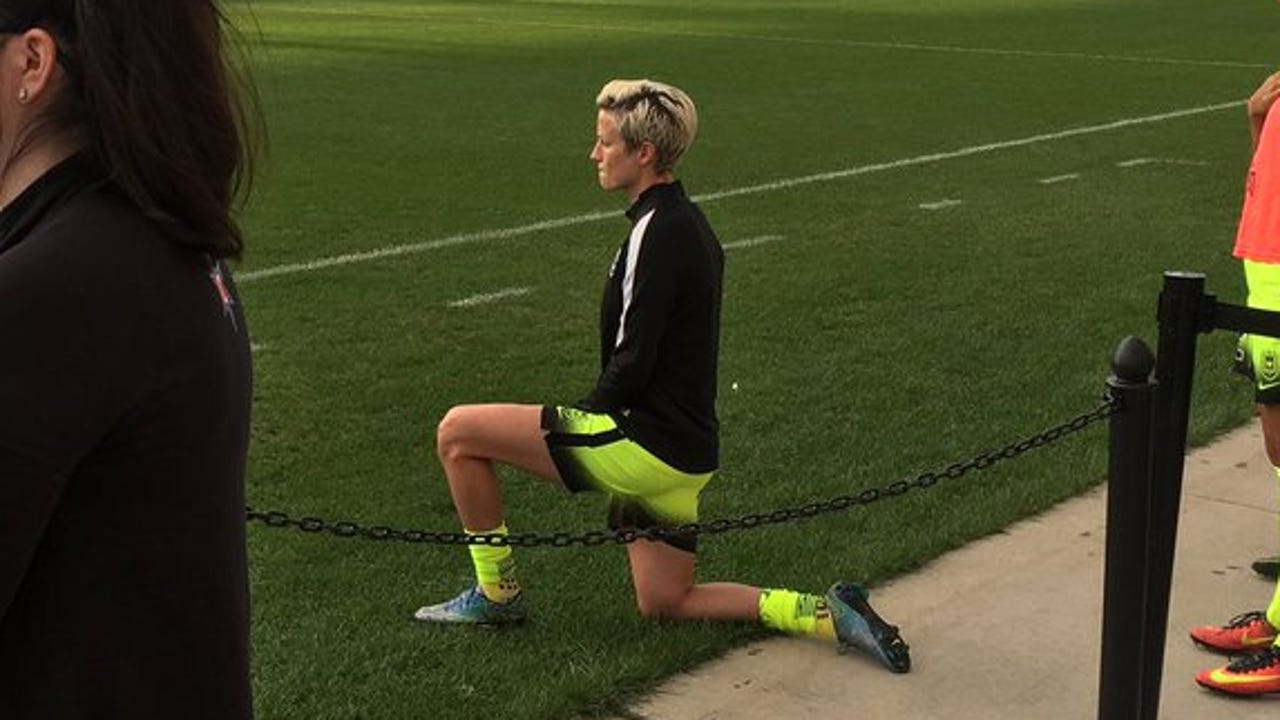 Soccer star Megan Rapinoe follows Colin Kaepernick in kneeling for anthem
