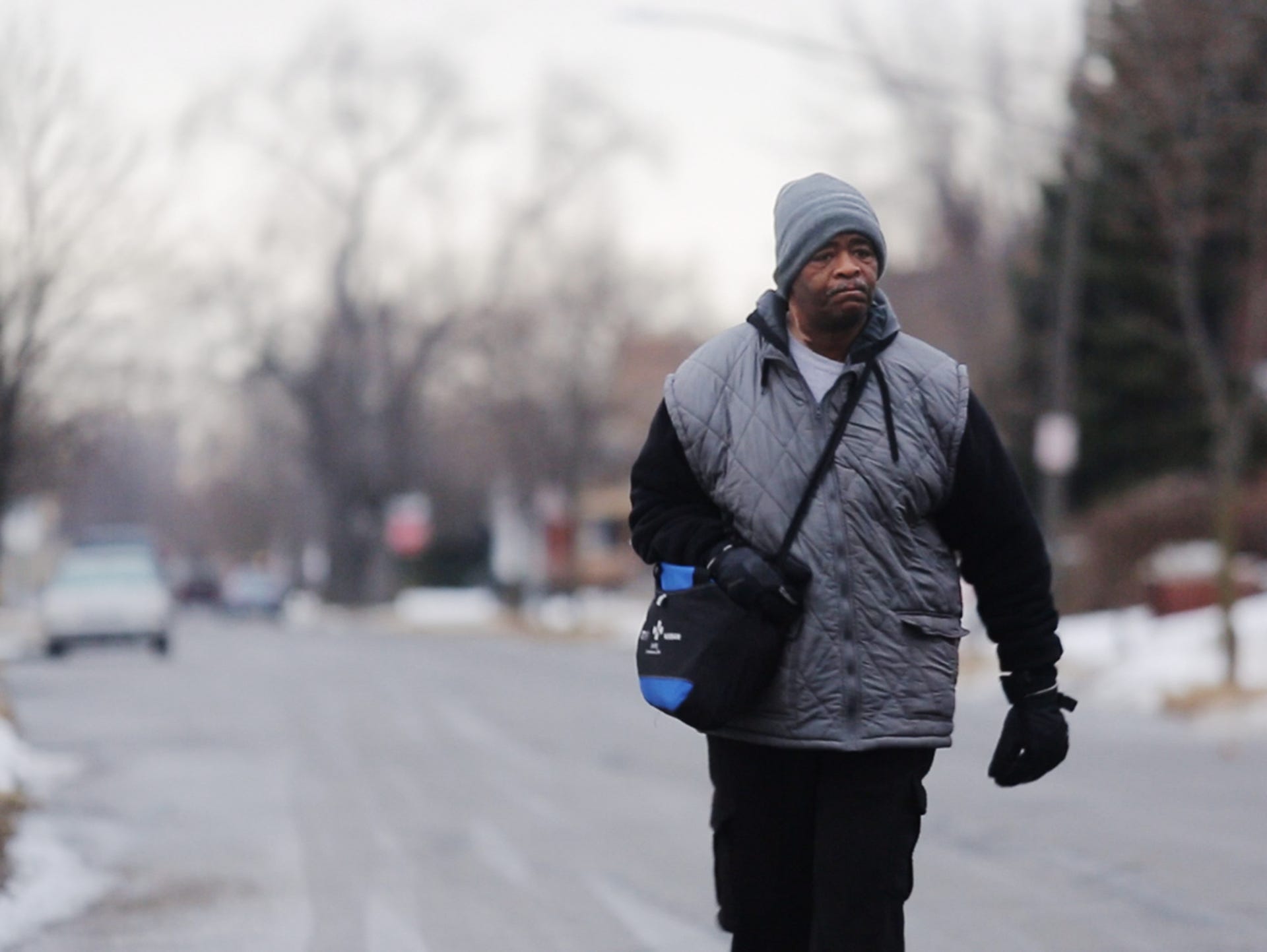 James Robertson, 56, of Detroit, walks toward Woodward