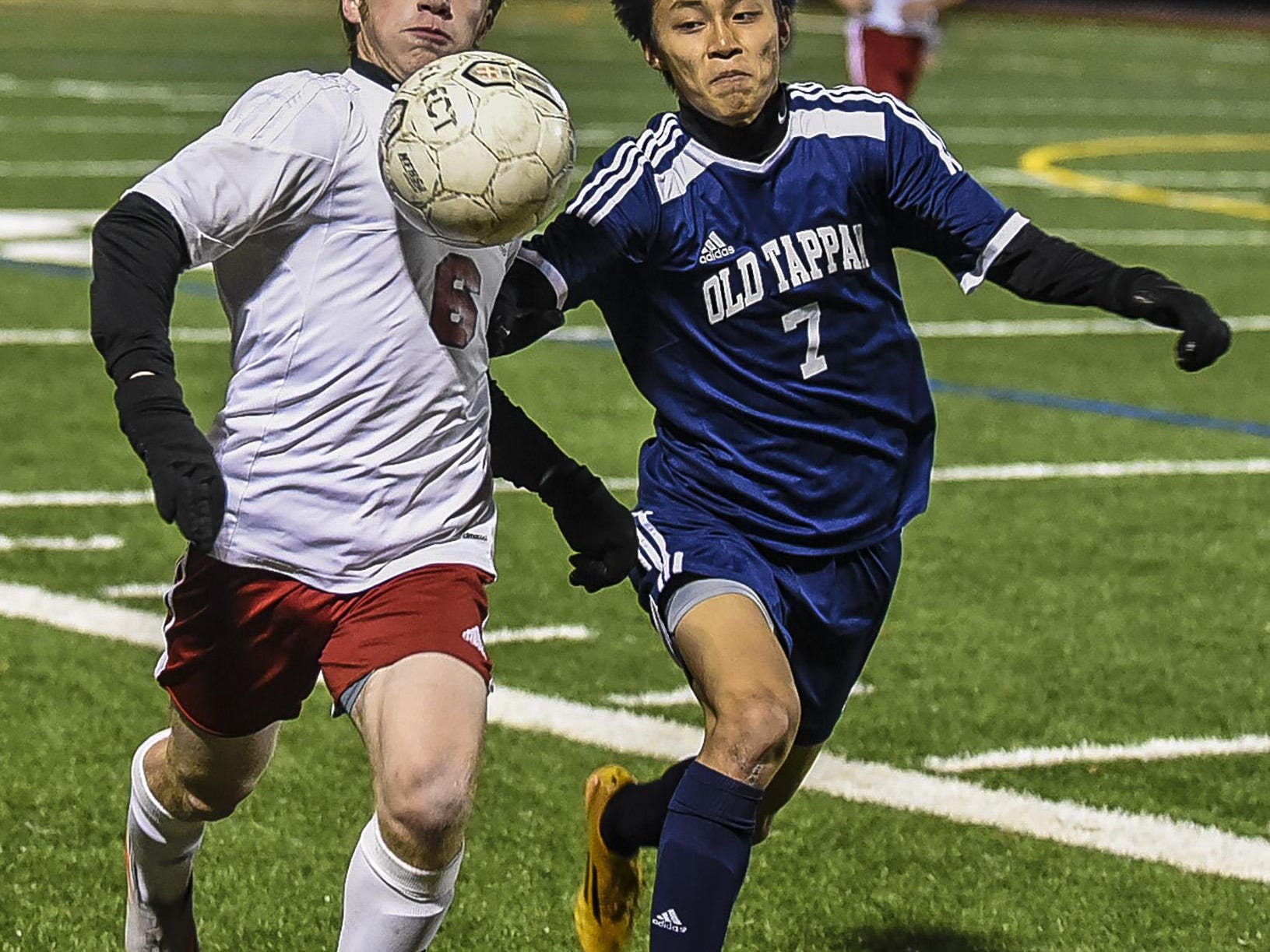 Mendham's Matt Hanks (6) and Old Tappan's Chris Lea (7) vie for the ball in the NJSIAA Group III Semifinal at Ridge High School in Basking Ridge, November 17, 2015. Photo by Warren Wetura for the Daily Record.