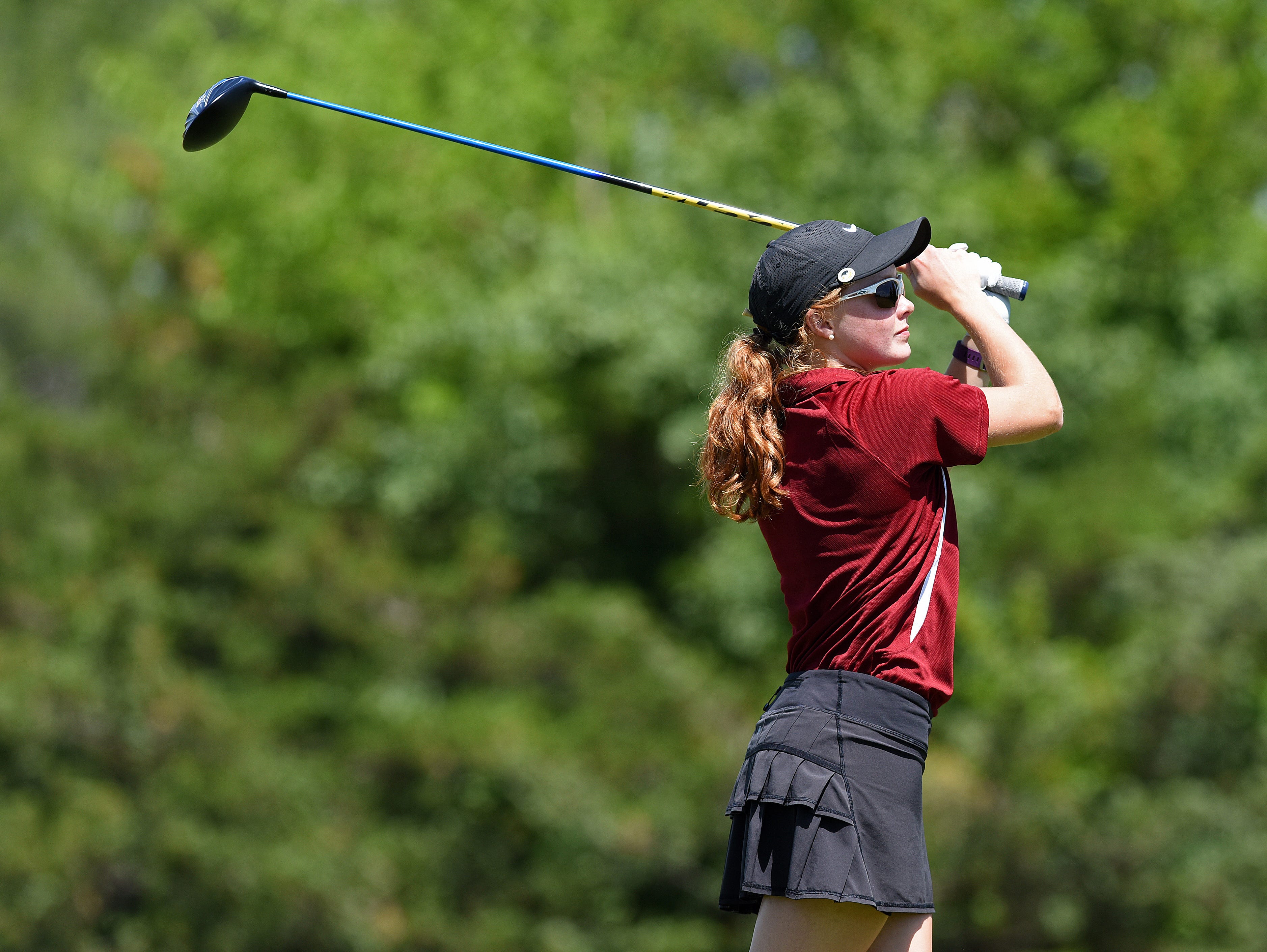 Roosevelt's McKayla Poppens tees off during the girls state golf tournament at Lakeview Golf Course in Mitchell, S.D., Tuesday, June 7, 2016.