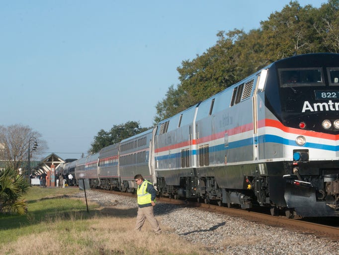 An Amtrak train stops at the Heinberg Street station