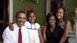 President Obama poses for a portrait with his family