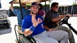 Feb. 27: Tim Tebow leaves on a golf cart after addressing