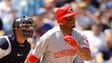 Ken Griffey Jr. hits 210 home runs with the Reds between