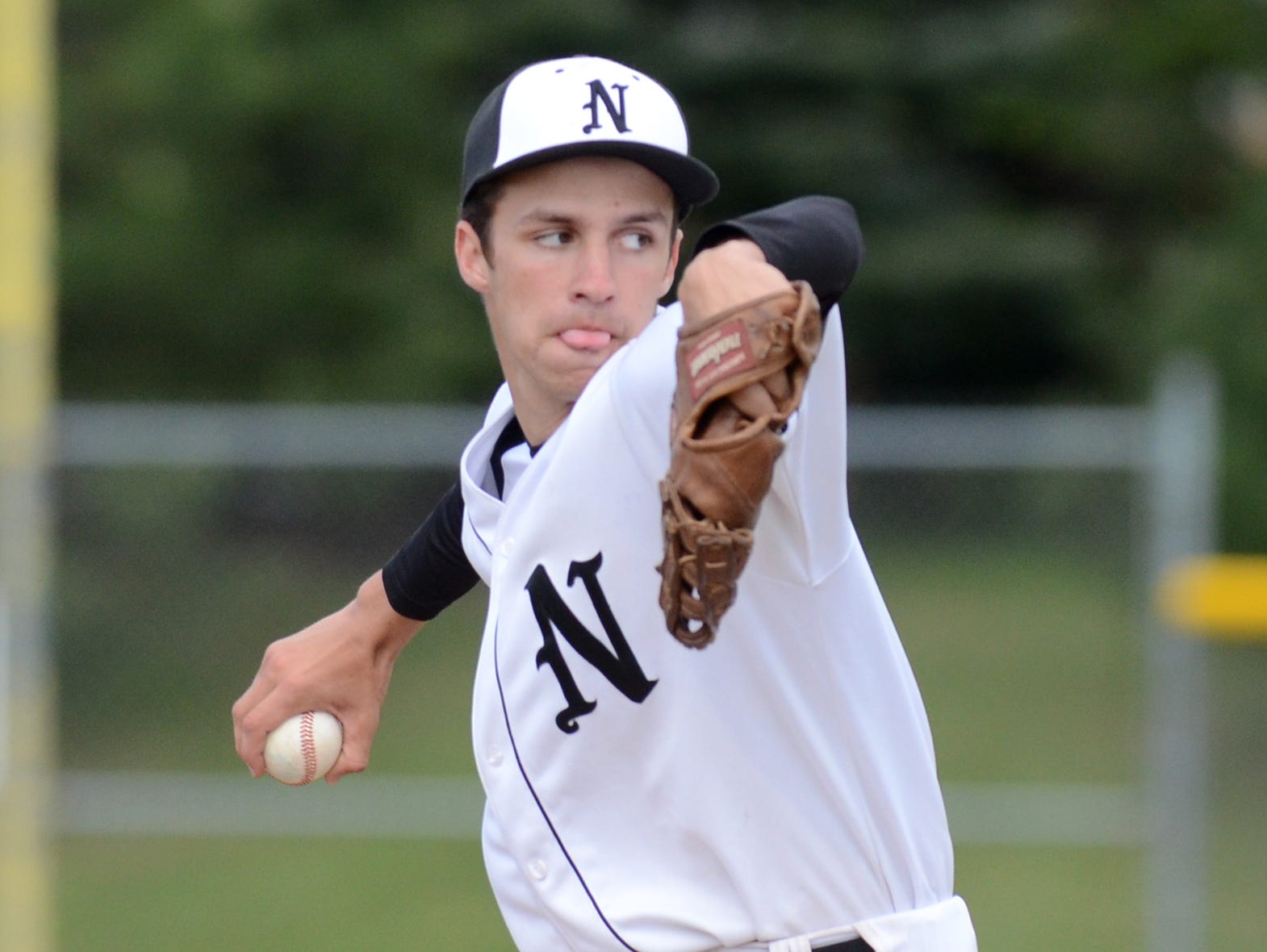 Northville senior right-hander Ian Borthwick fires a pitch toward the plate in the KLAA Association final win over Brighton.