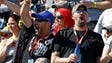 Race fans cheer on their drivers during the NASCAR