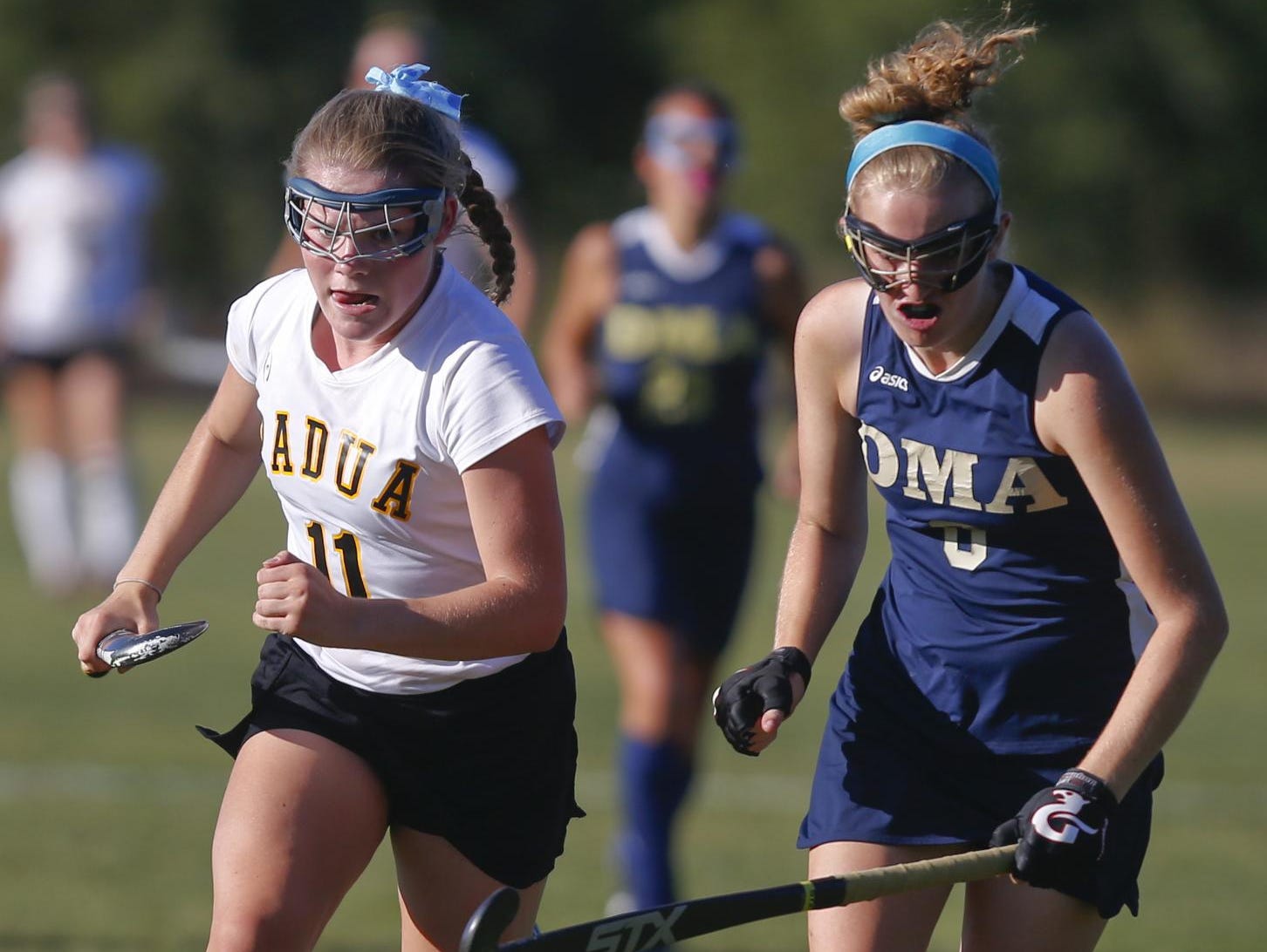Padua’s Jill Sherman (left) pursues the ball with Delaware Military Academy’s Maya Sortino in Padua’s 5-0 win at Forbes Field on Wednesday.