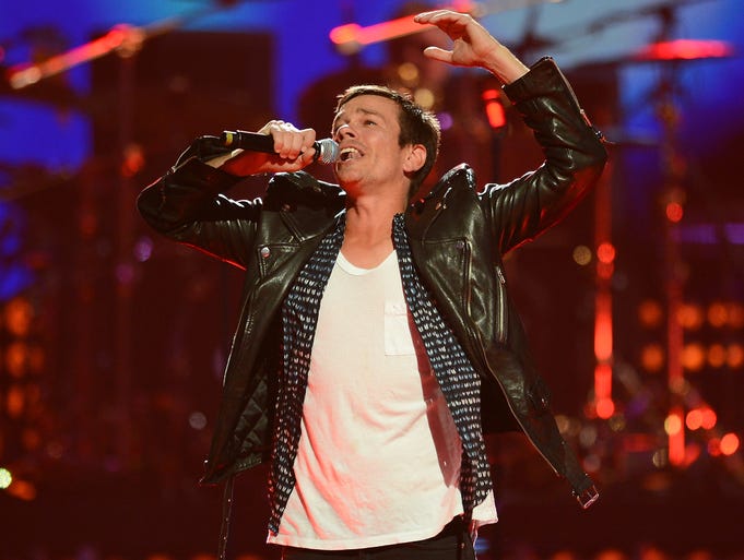 Nate Ruess of fun. performs onstage with Queen during iHeartRadio on Sept. 20 in Las Vegas.
