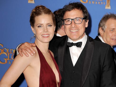 Amy Adams and director David O. Russell pose at the Golden Globe Awards.