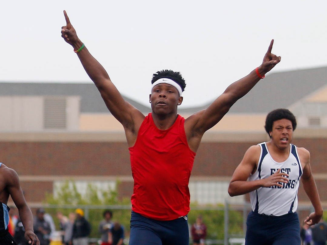Everett's Marice Allen celebrates as he wins the 200 meter dash May 20, 2016, in Holt.