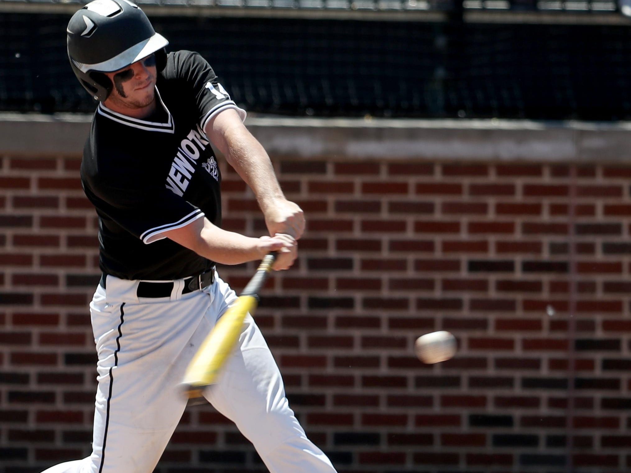 New Lothrop #14 Cam Pope gets a hit against Jackson Lumen Christi on Friday, June 17, 2016 at the MHSAA Division 3 baseball semi finals at Michigan State University in East Lansing, Michigan. New Lothrop won the game 6-1 to reach the division 3 finals on Saturday. Eric Seals/Detroit Free Press