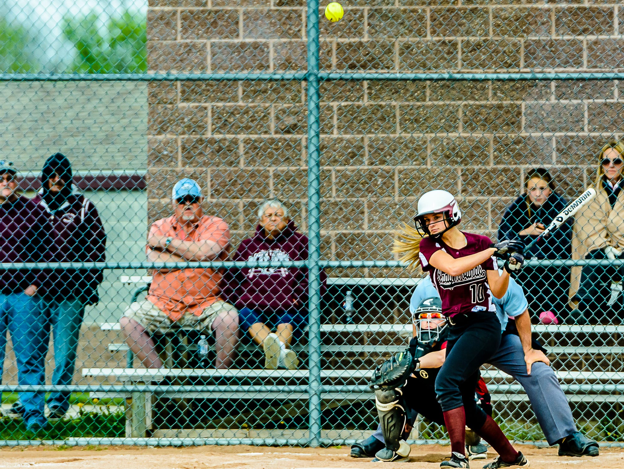 Shelby Steele of Eaton Rapids swings for a basehit in the 1st inning of the second game the Greyhounds' double-header with Portland Monday May 9, 2016 in Eaton Rapids. KEVIN W. FOWLER PHOTO