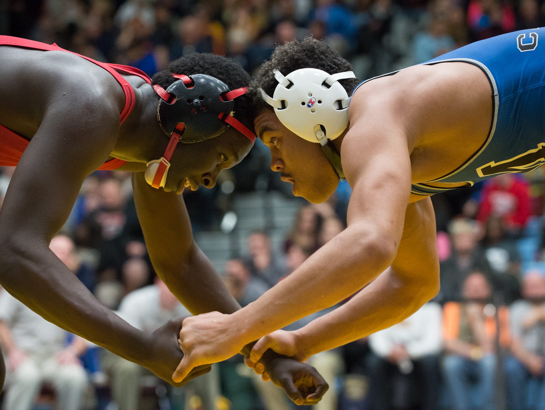 Middletown's Isiah Mitchell, right faces off against Smyrna's Larsen Wilson in the 170 pound quarterfinals at the DIAA Individual State Tournament at Cape Henlopen High School.