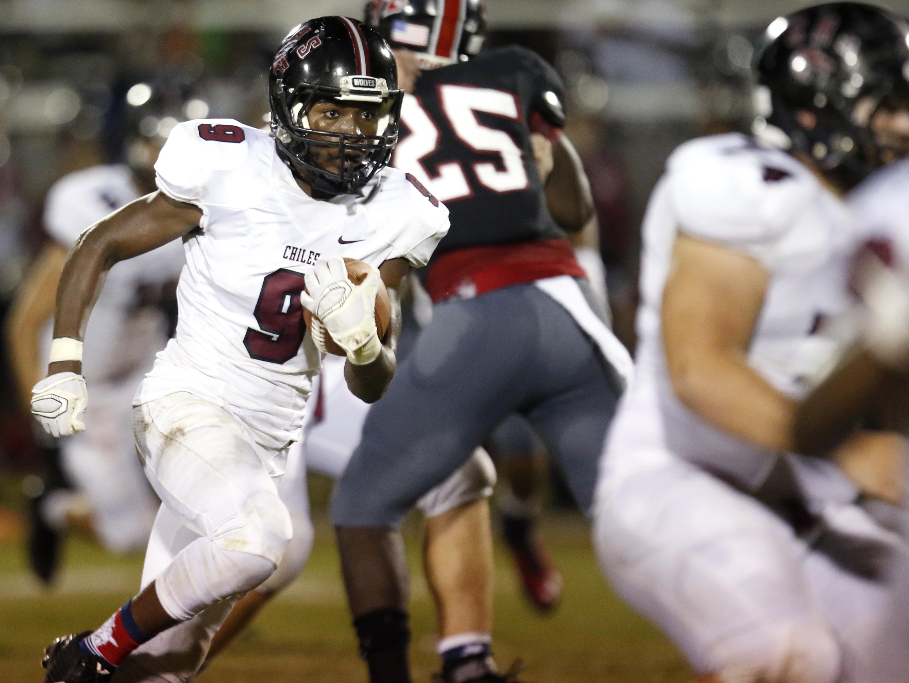 Chiles' Shane Sanders runs the ball against NFC during their game at North Florida Christian on Friday.