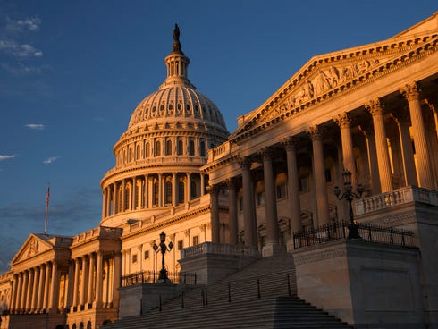 The morning sun illuminates the U.S. Capitol in Washington on Monday.