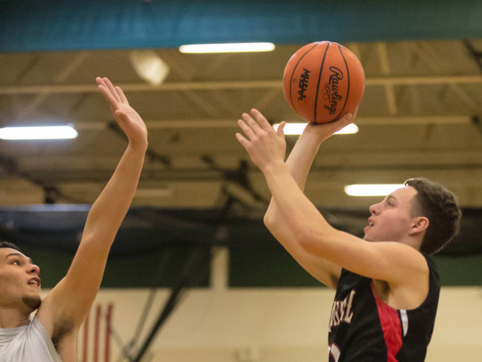 Marshall's T.J. Rocco (15) takes a shot during Friday night's game.