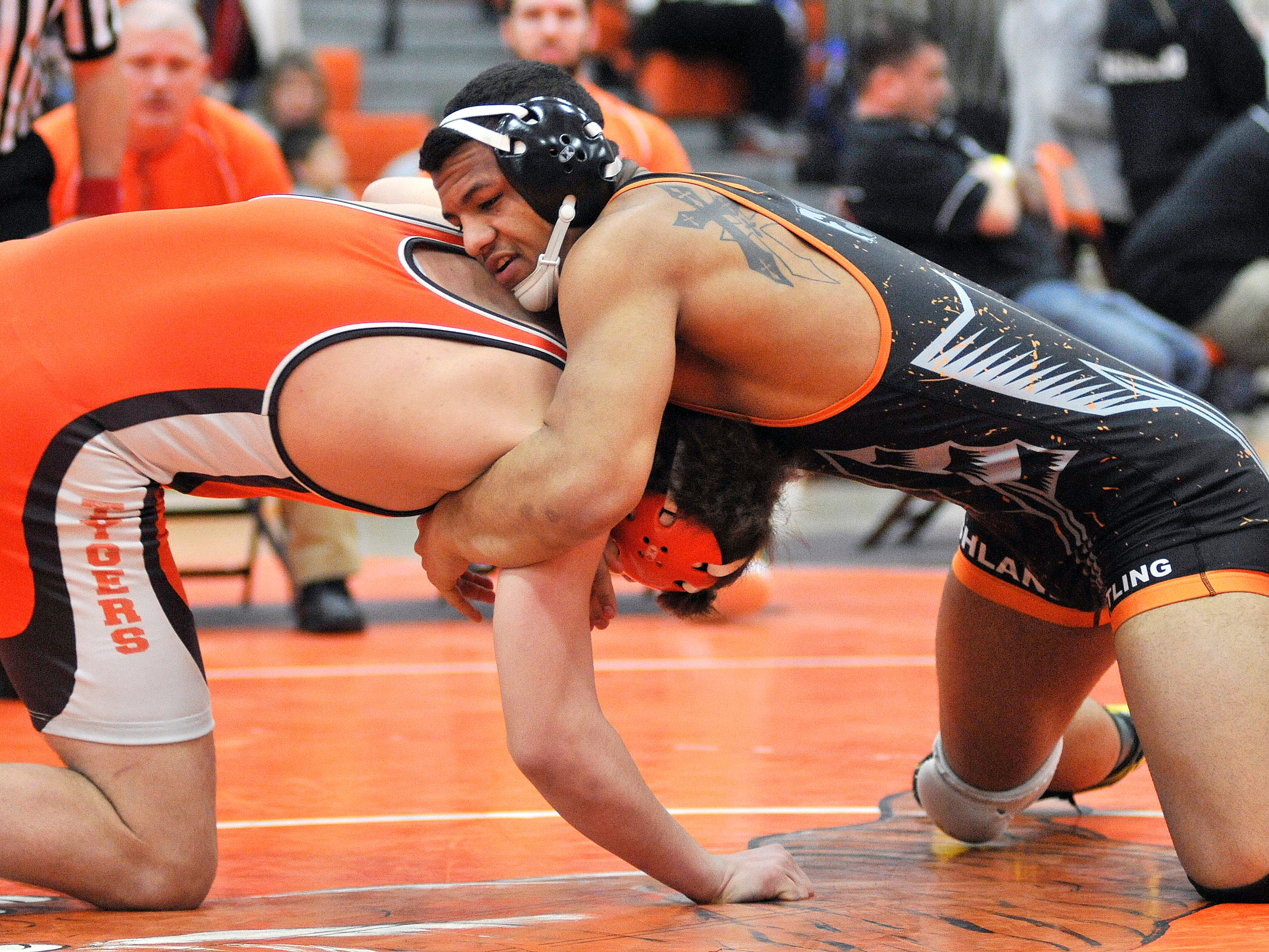 Ashland’s Tristen Weirich pins Mansfield Senior’s Devin Marsh in 24 seconds to win a Division I sectional title Saturday in Pete Henry Gym.
