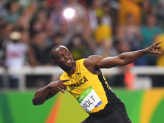 Usain Bolt (JAM) wins gold in the men’s 200.