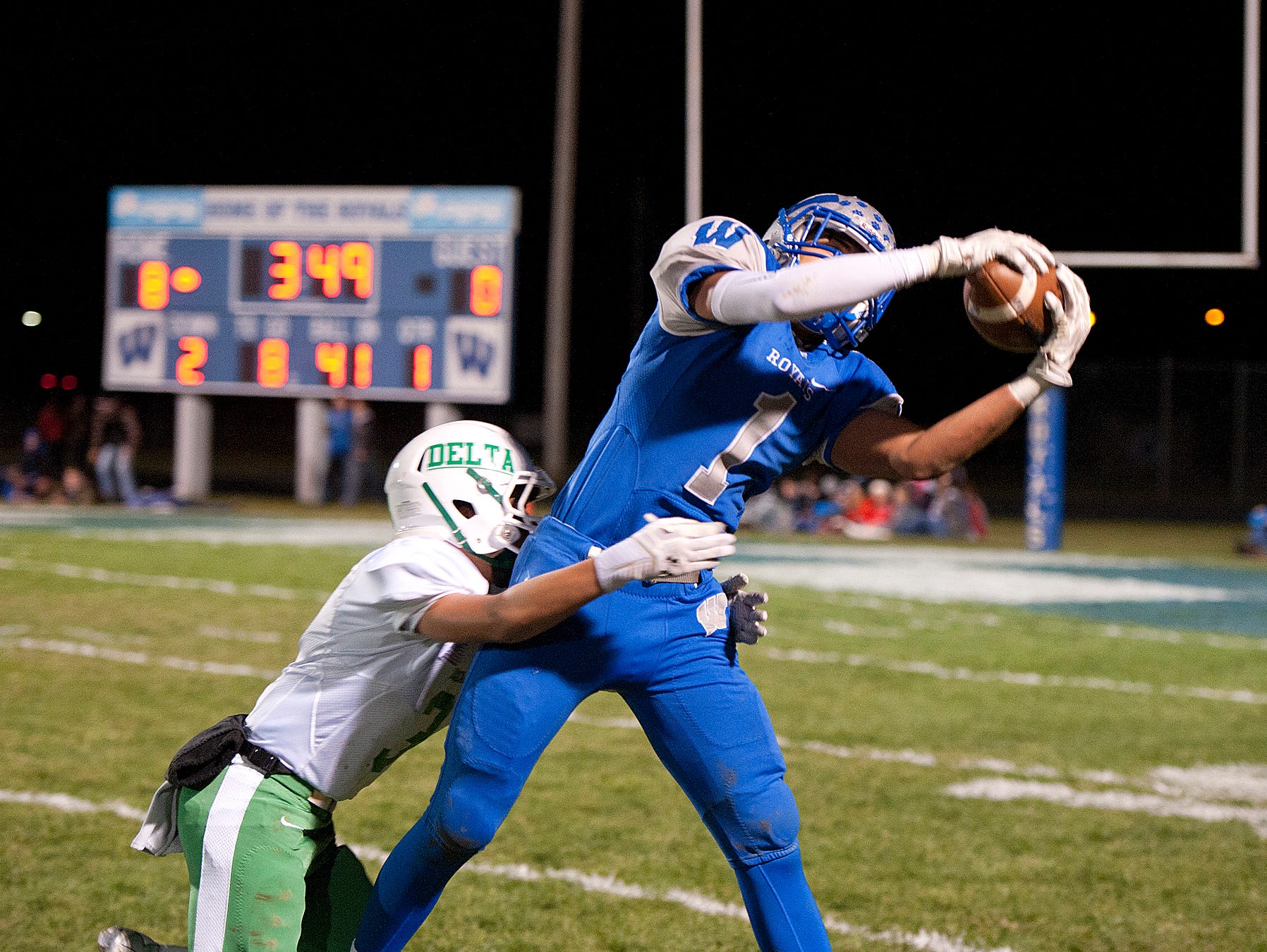 Wynford's Tony Watson catches a pass in the first quarter.