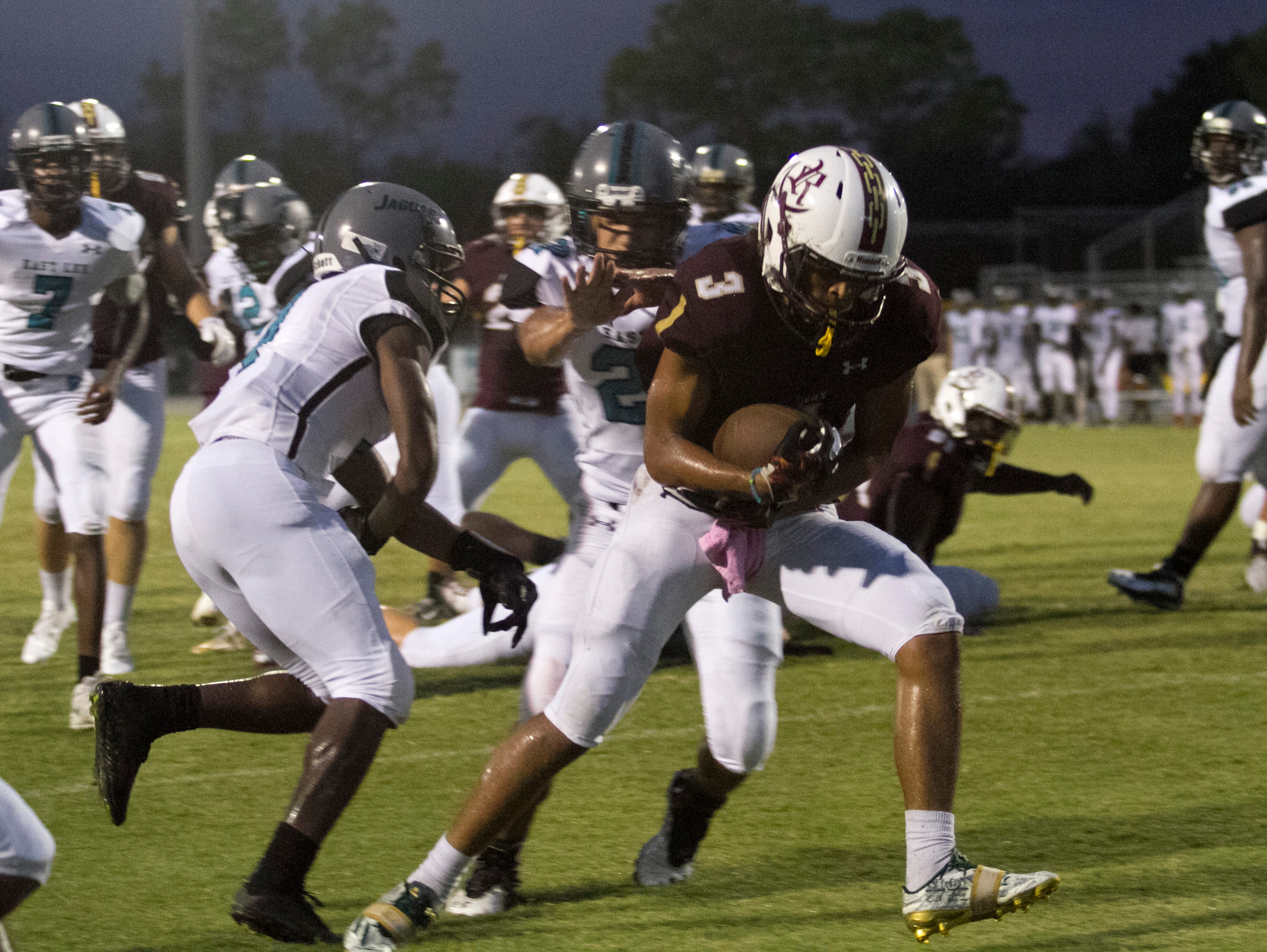 Riverdale's Jaylin Cochran scores the first touchdown against East Lee on Friday, September 16, 2016, at Riverdale High School.