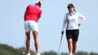 Inbee Park of South Korea watches Stacy Lewis of the