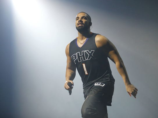 Drake rocks the house with his  Phoenix Suns' Devin