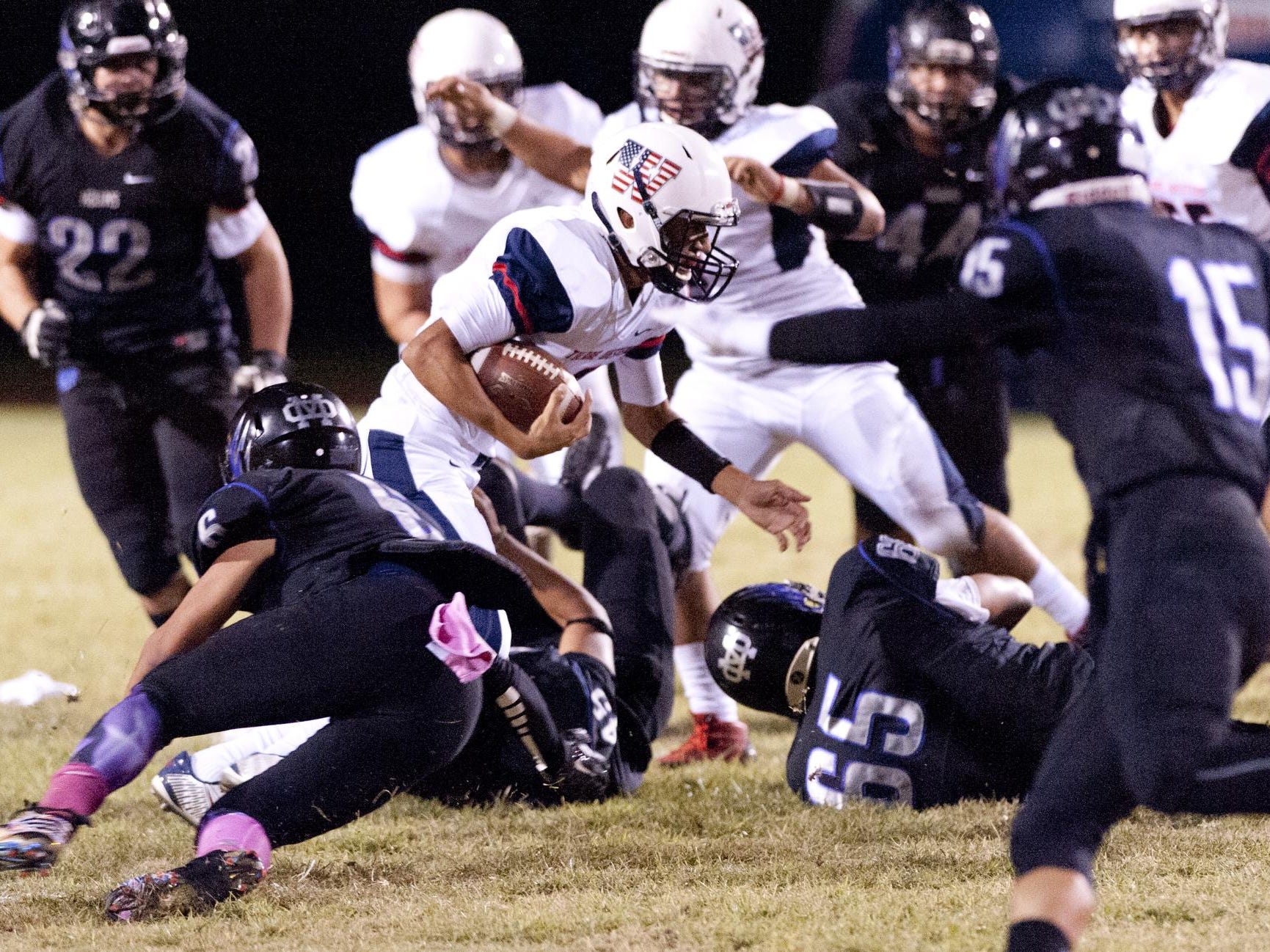 Tulare Western quarterback Andre Aguilar accounted for four touchdowns in the Mustangs’ 40-24 win over Mission Oak.