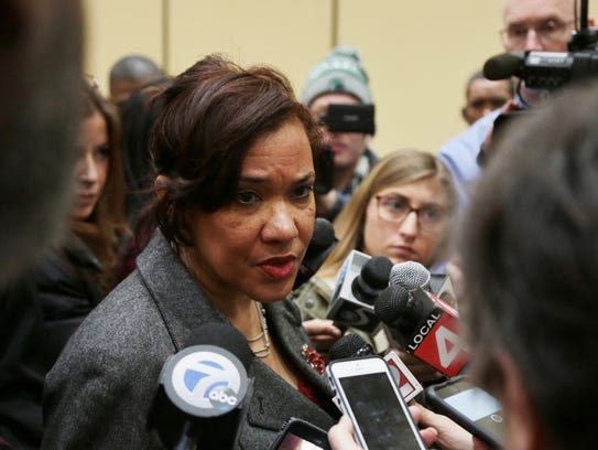 Flint Mayor Karen Weaver talks with press after Attorney