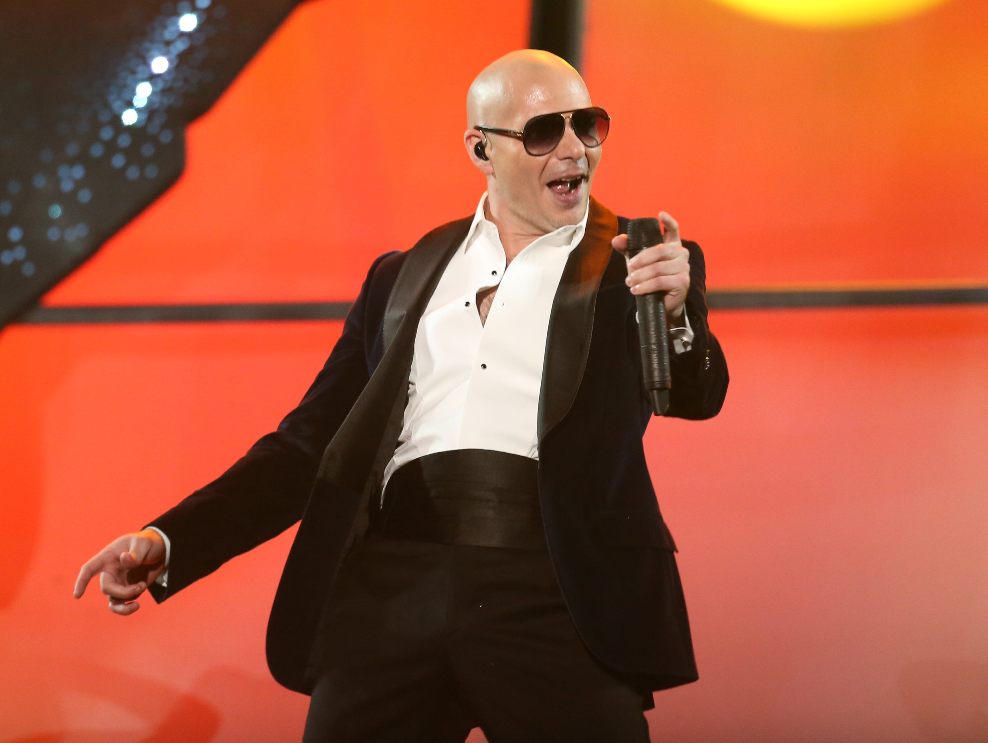 Rapper Pitbull performs in 2014 at the 42nd annual American Music Awards in Los Angeles.