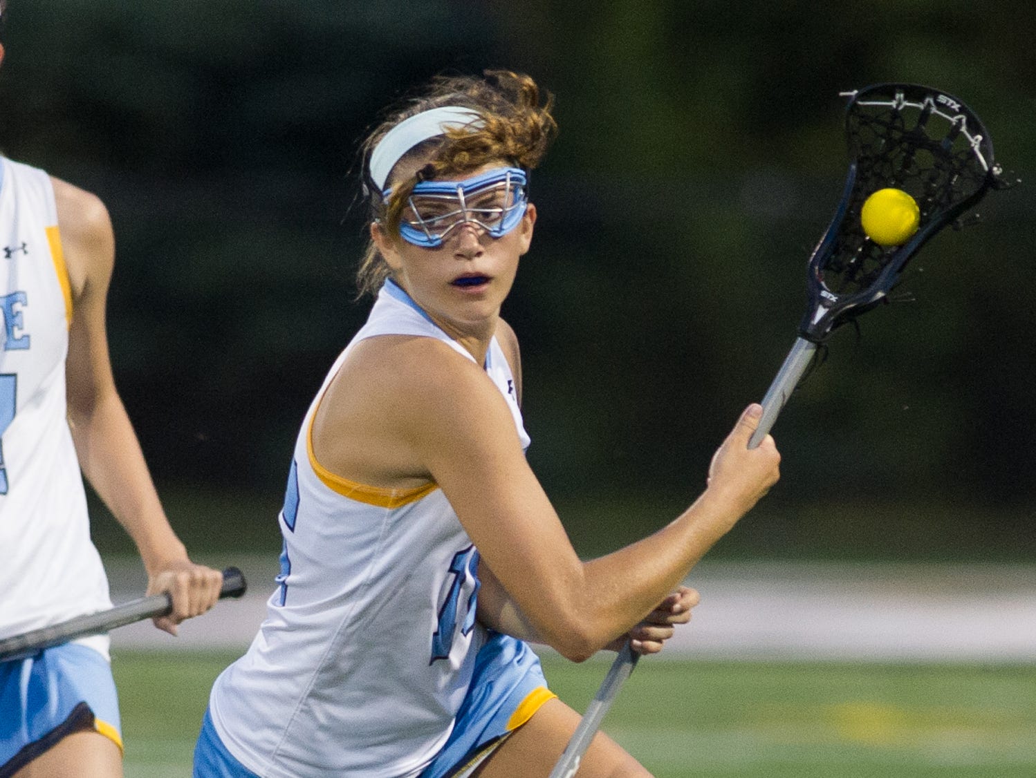 Cape Henlopen's Alia Marshall (16) runs down the field during the second have of play in the DIAA girls lacrosse championship game against Tower Hill at Wesley College in Dover.