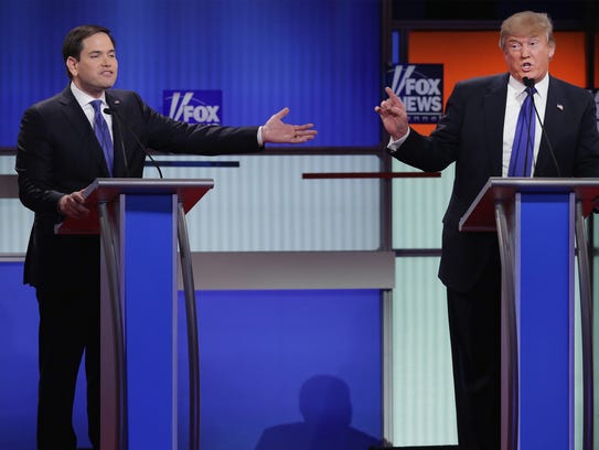 Marco Rubio and Donald Trump participate in a debate