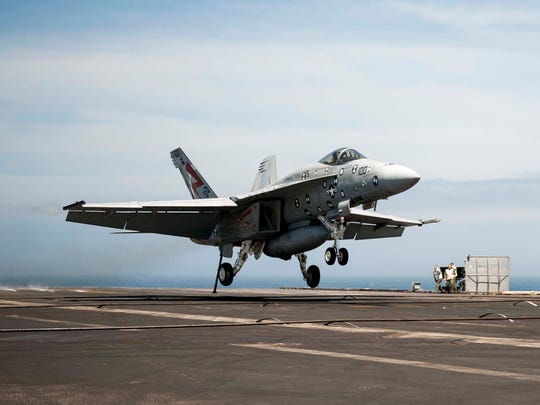 “Salty Dog 100,” an F/A-18F Super Hornet assigned to