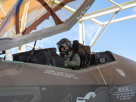 Maj. Raven "Rost" LeClair checks his F-35 jet before