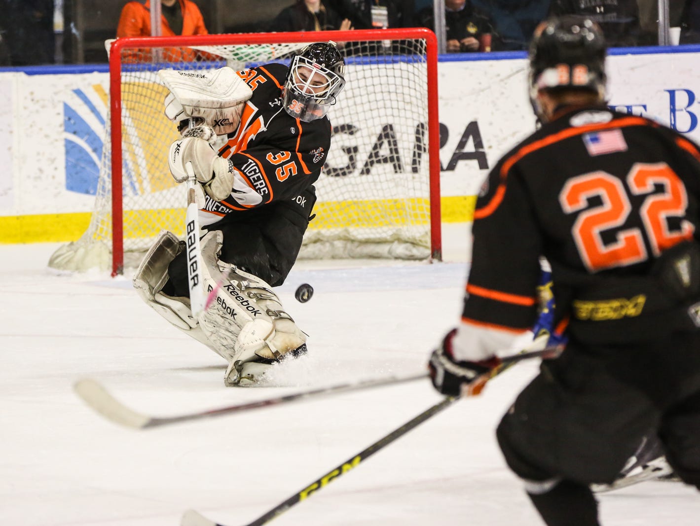 Mamaroneck's Tommy Spero (35) clears the puck in the third period. Mamaroneck defeated West Genesee 1-0 and won the NYSPHSAA Division 1 HarborCenter in Buffalo, NY.