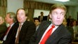 Donald Trump, right, waits with his brother Robert