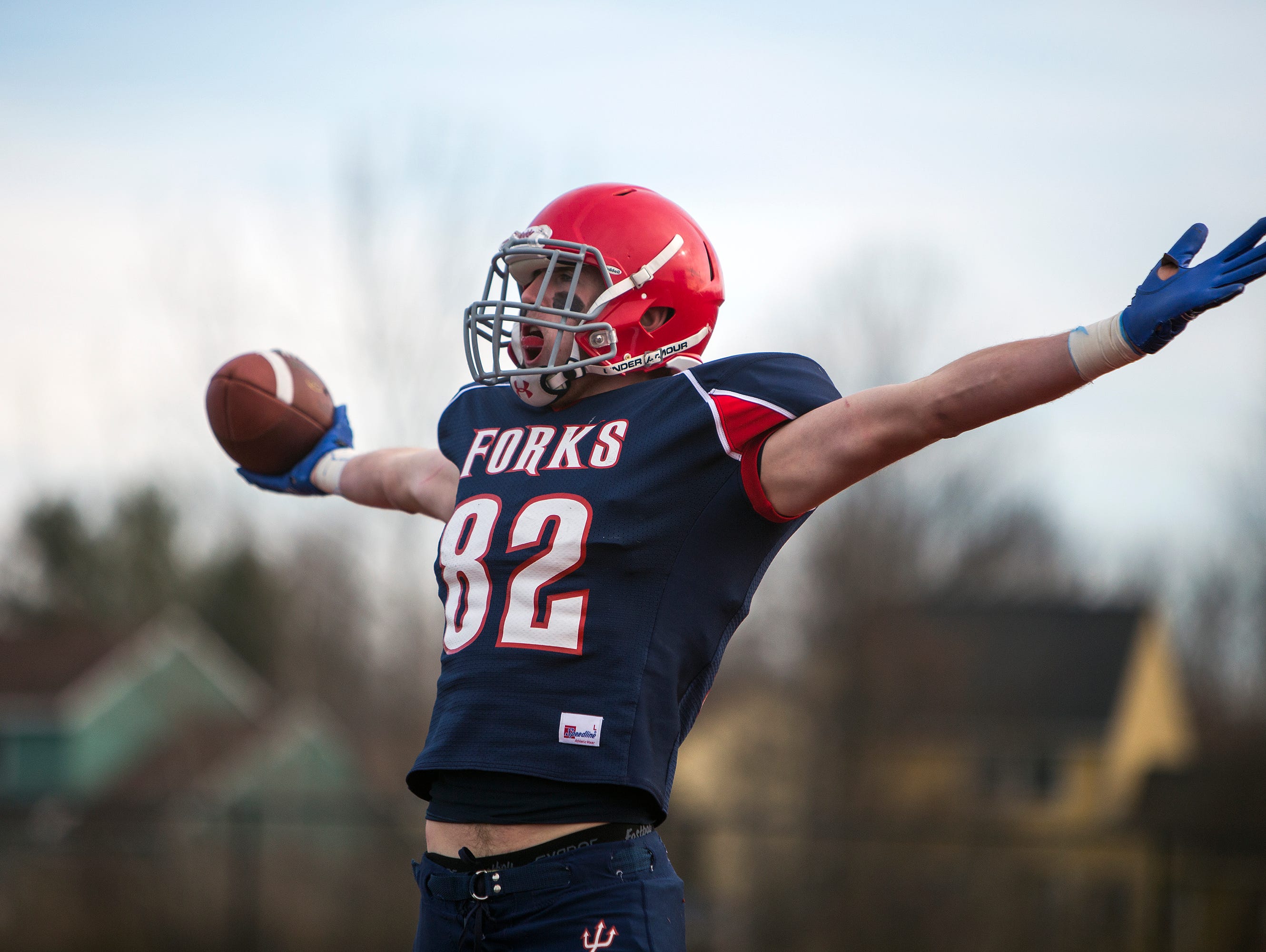 Chenango Forks tight end Trevor Borchardt celebrates his touchdown reception during the first quarter of the Class C state playoff semifinal against Bath on Saturday, Nov. 21, 2015.