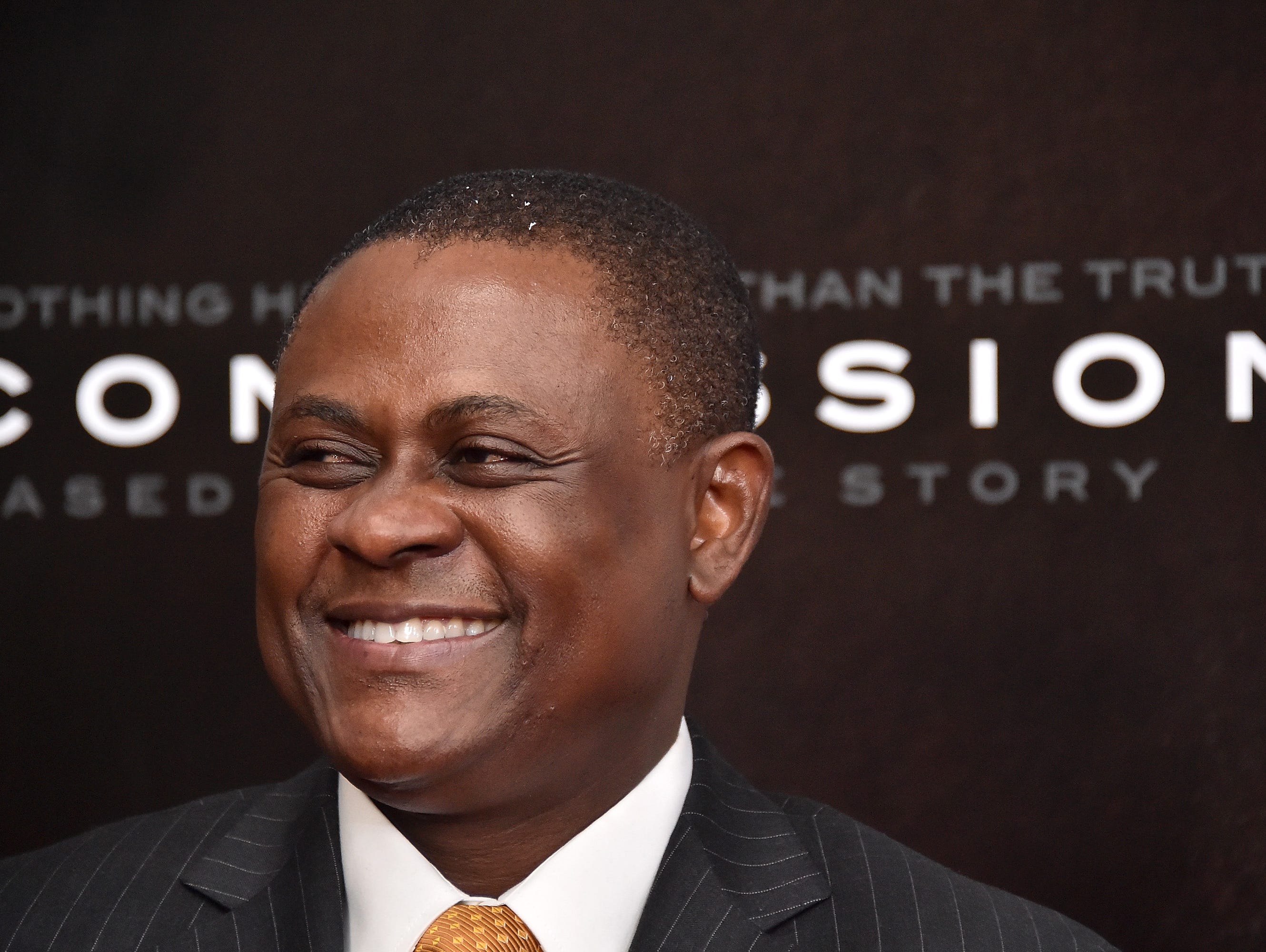 Dr. Bennet Omalu attends the"Concussion" New York Premiere at AMC Loews Lincoln Square on December 16, 2015 in New York City. (Photo by Mike Coppola/Getty Images)