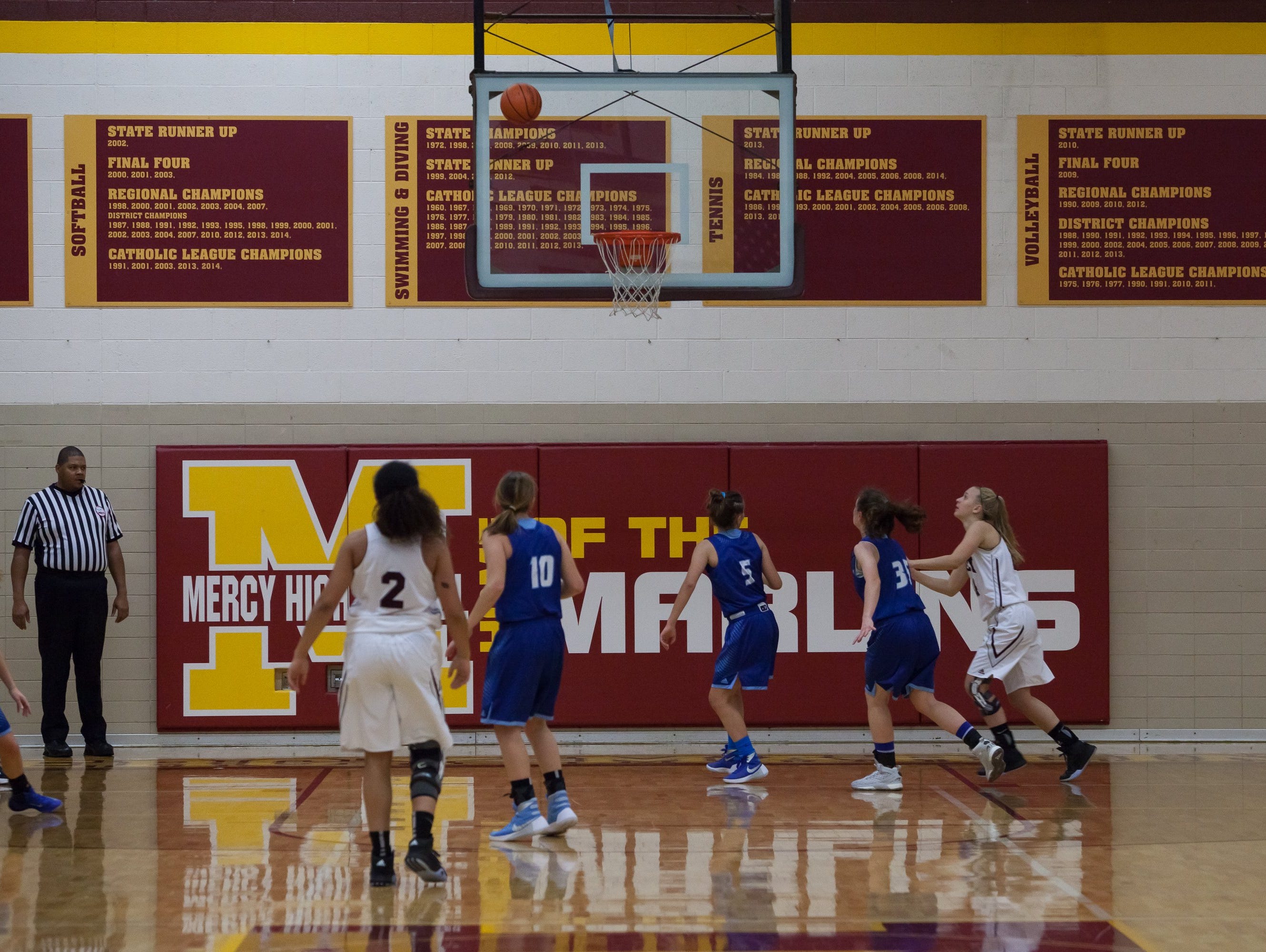 The reunion of the Mercy High School‘s 1977 and 1982 state championship teams was held during the Marlins Catholic League Central Division opener against Warren Regina at Farmington Hills Mercy on Friday, Jan. 8, 2016.