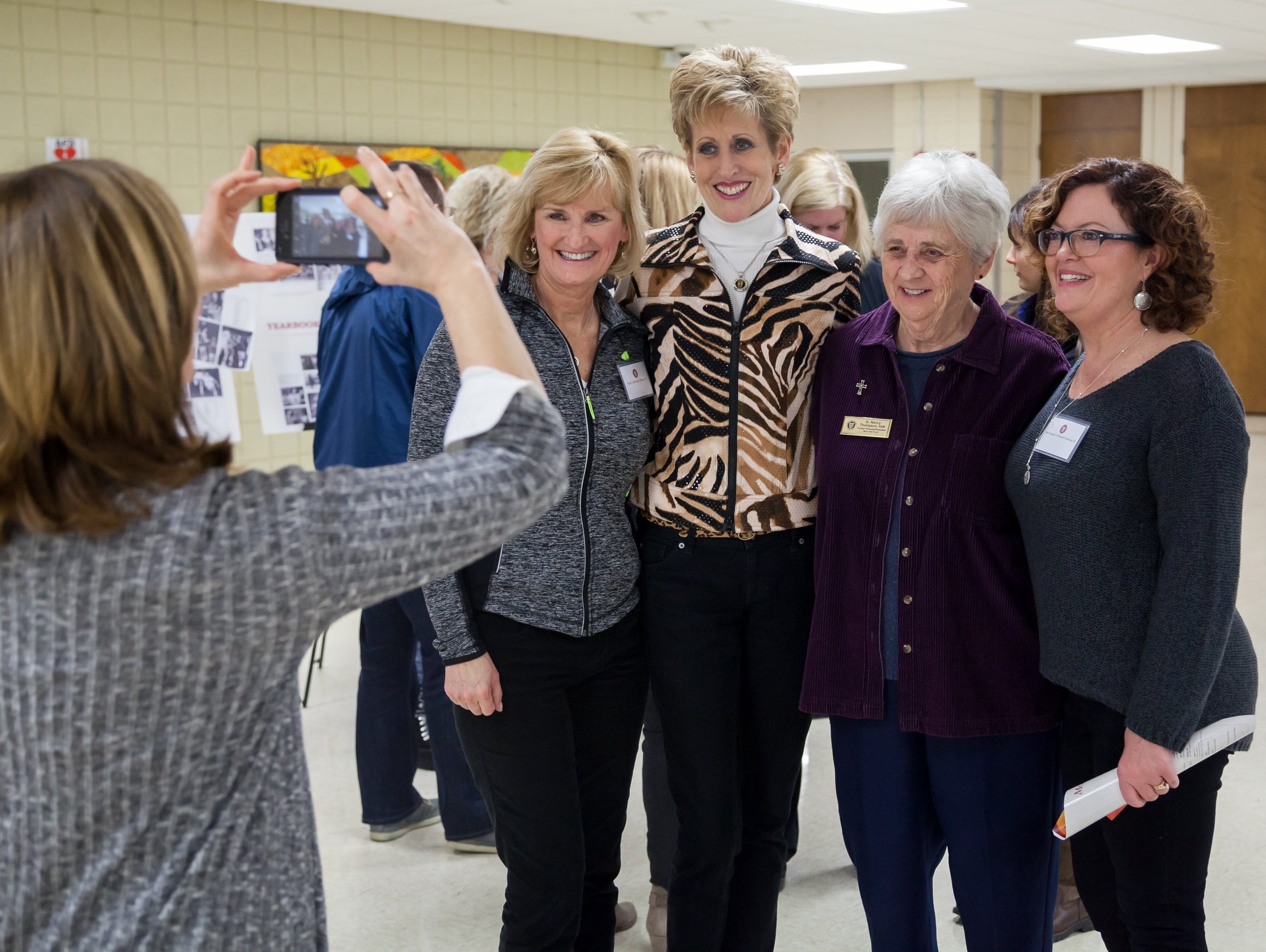 Friends, family and faculty joined in the celebration of Mercy High School’s 1977 and 1982 state championship basketball teams at Farmington Hills Mercy on Friday, Jan. 8, 2016.