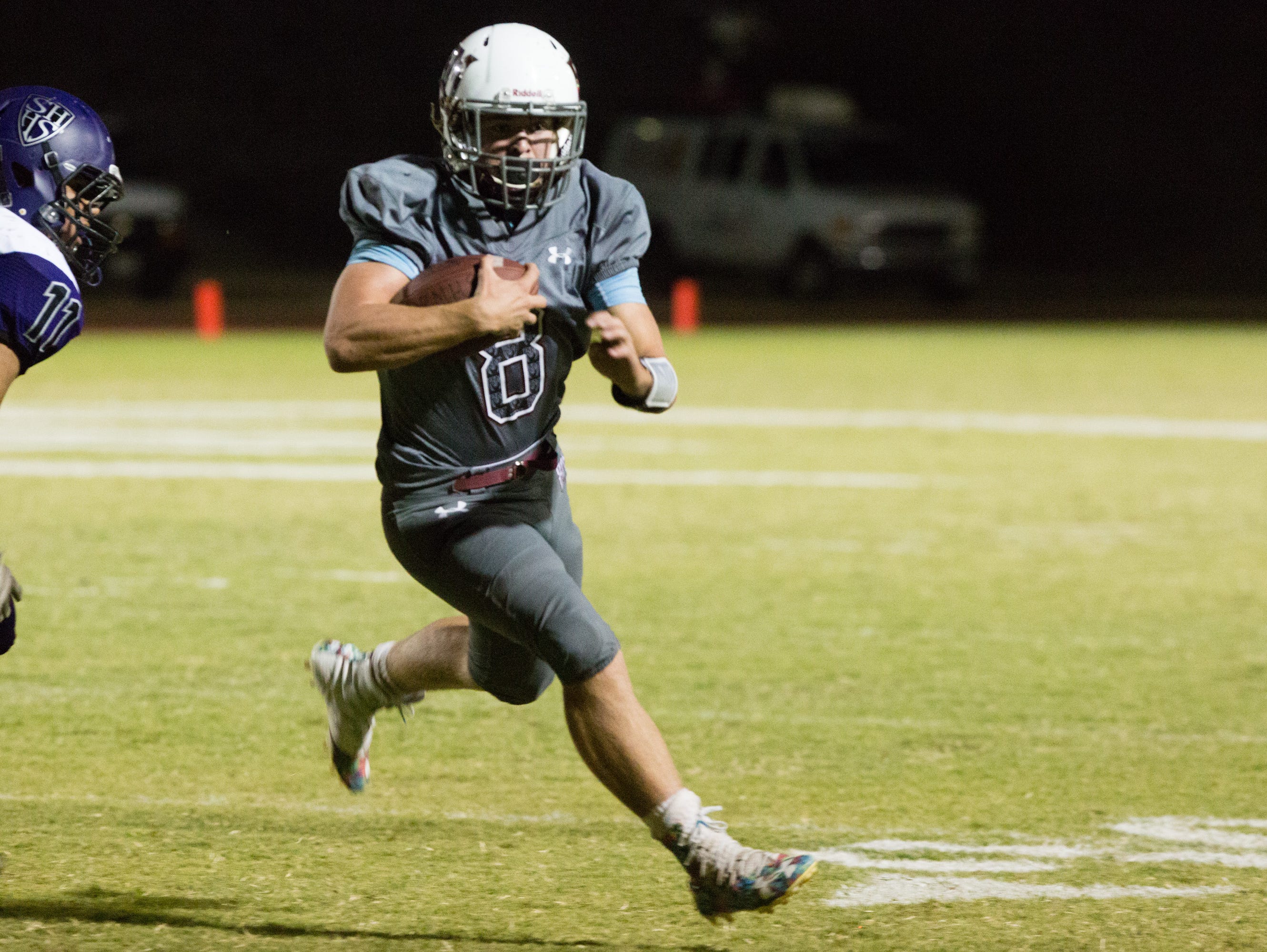 Kyle Whitefield runs the ball for a touchdown for Rancho Mirage, Friday, September 2, 2016.